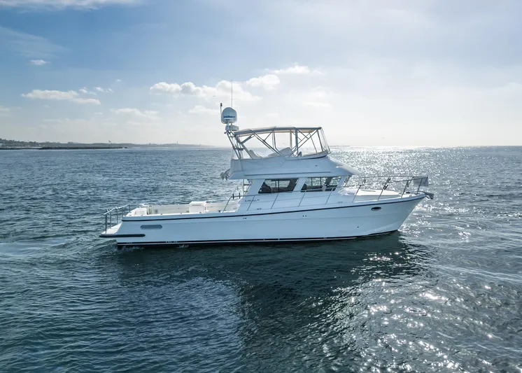  Yacht Photos Pics 2018 Lindell 46 F yacht cruising on open water under clear skies.