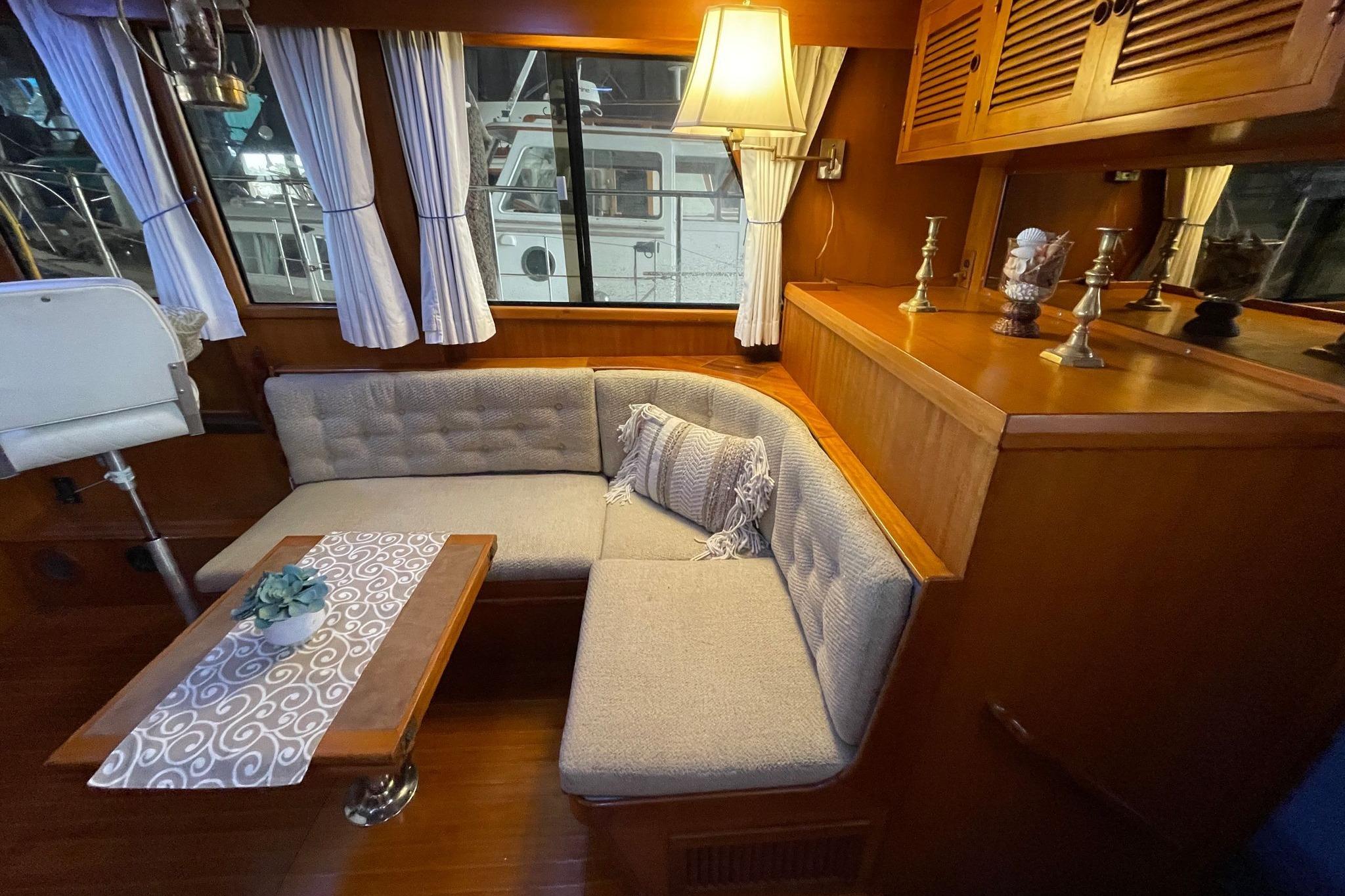 Cozy interior of 1986 NOVA MARINE 36 Sundeck with elegant seating and decor.