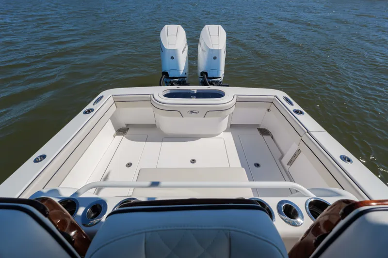 Sea Dawg Yacht Photos Pics 2024 Valhalla Boatworks V-33 cockpit with dual engines on calm water.