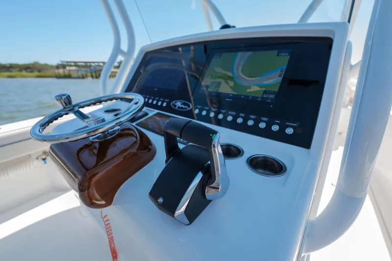 Sea Dawg Yacht Photos Pics 2024 Valhalla Boatworks V-33 helm with advanced navigation display and controls.