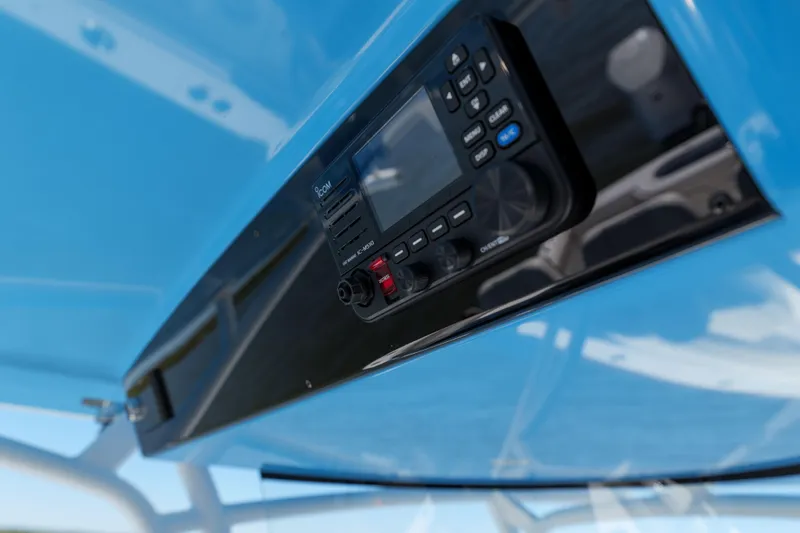 Sea Dawg Yacht Photos Pics 2024 Valhalla Boatworks V-33, featuring a modern control panel under a blue canopy.