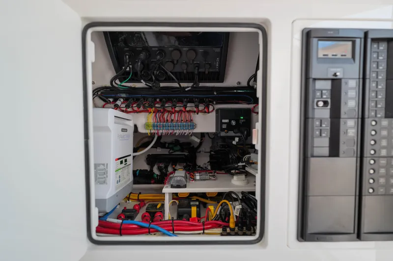 Sea Dawg Yacht Photos Pics Electrical panel of 2024 Valhalla Boatworks V-33, showcasing wiring and components.