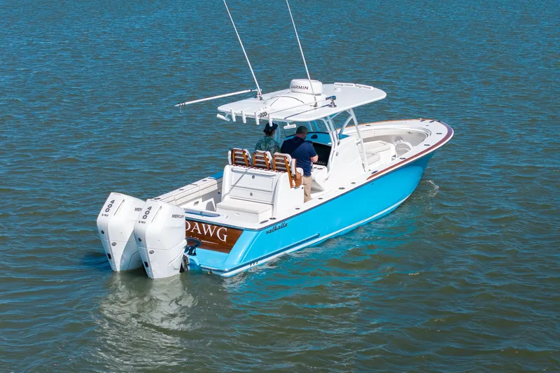 Sea Dawg Yacht Photos Pics 2024 Valhalla Boatworks V-33 on water, featuring dual Mercury engines.
