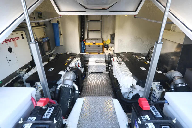 Blue Stiel Yacht Photos Pics Engine room of 2009 Regal 52 Sport Coupe with dual engines and equipment.