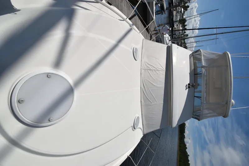 Sea Marie Yacht Photos Pics 2007 Silverton 38 Convertible yacht docked under clear blue sky.