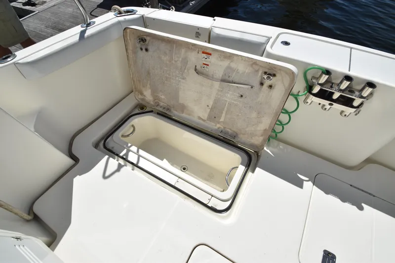 Sea Marie Yacht Photos Pics Open storage compartment on 2007 Silverton 38 Convertible boat deck.