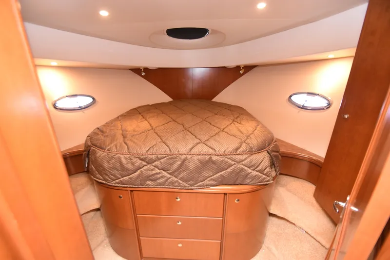 Sea Marie Yacht Photos Pics Luxurious cabin interior of 2007 Silverton 38 Convertible yacht with cozy bed.