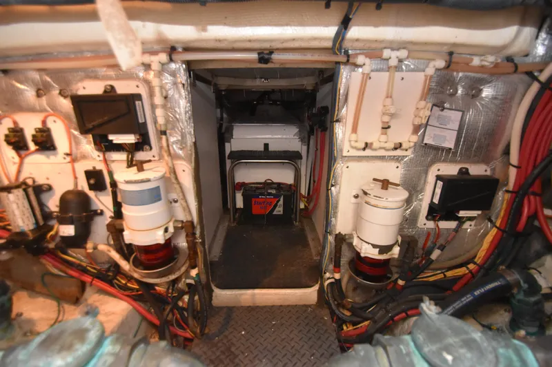 Sea Marie Yacht Photos Pics Engine room of a 2007 Silverton 38 Convertible boat, showcasing wiring and components.