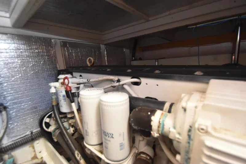 Sea Marie Yacht Photos Pics Engine room of a 2007 Silverton 38 Convertible boat, showing filters and components.