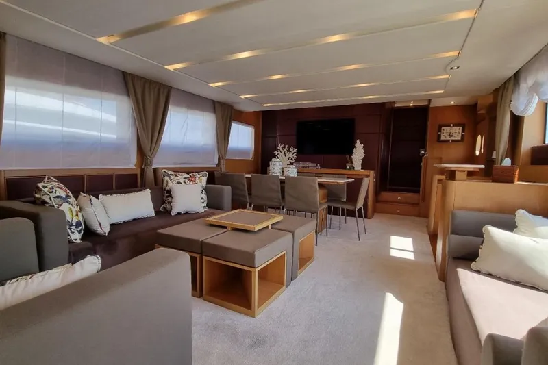 Red Rose Yacht Photos Pics Luxurious interior of 2010 Aicon 85 yacht with elegant seating and modern decor.