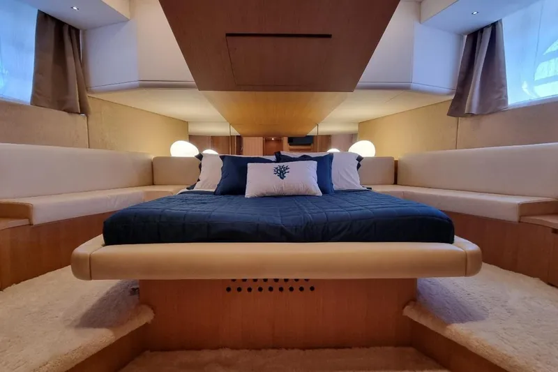 Red Rose Yacht Photos Pics Luxurious interior of 2010 Aicon 85 yacht with elegant bedding and ambient lighting.