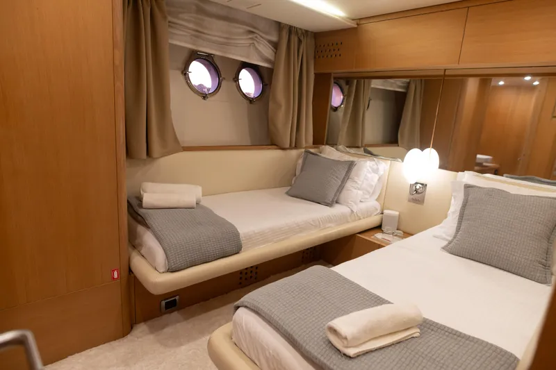 Red Rose Yacht Photos Pics Luxurious cabin interior of 2010 Aicon 85 yacht with twin beds and elegant decor.