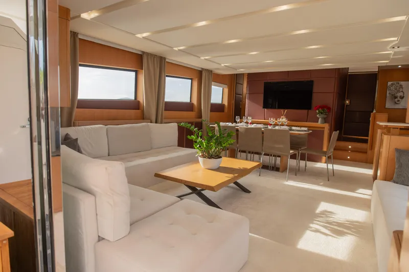 Red Rose Yacht Photos Pics Luxurious interior of 2010 Aicon 85 yacht with elegant dining area and modern decor.