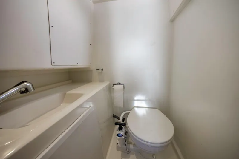 Shanti Yacht Photos Pics Compact bathroom in 2015 Prestige 500FB yacht with toilet and sink.