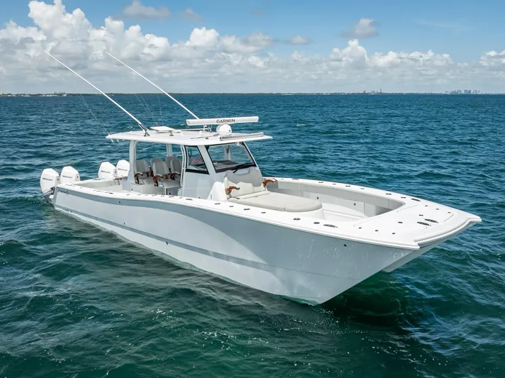  Yacht Photos Pics 2023 Freeman 43 boat cruising on open ocean under clear skies.