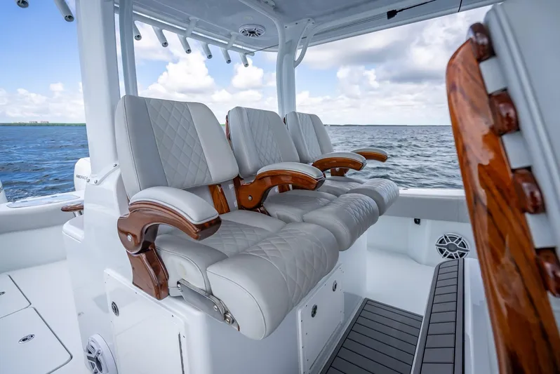  Yacht Photos Pics Luxurious seating on 2023 Freeman 43 boat with ocean view.