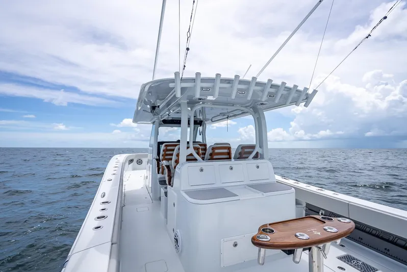  Yacht Photos Pics Freeman 43 boat, 2023 model, cruising on open sea under cloudy sky.