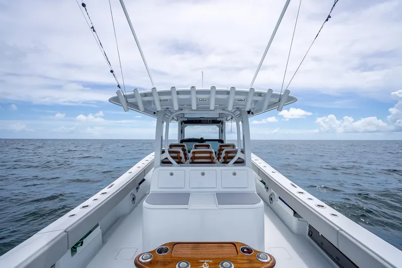  Yacht Photos Pics 2023 Freeman 43 boat on open sea under cloudy sky.