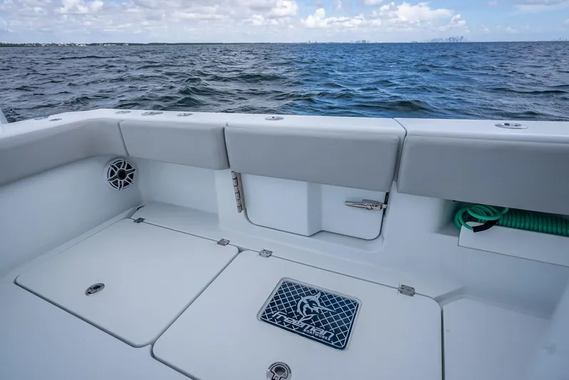  Yacht Photos Pics Freeman 43 boat deck overlooking ocean, 2023 model, with storage compartments and seating.