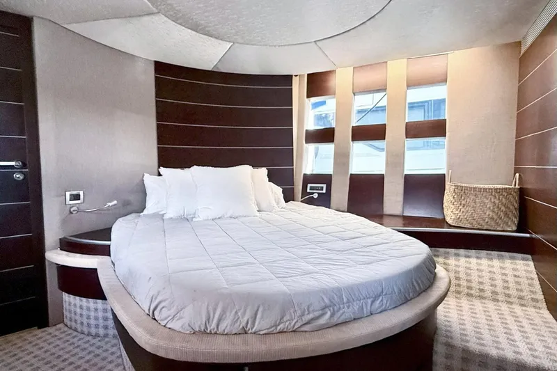 Boat Yacht Photos Pics Luxurious bedroom interior of 2011 Azimut 68S yacht with modern design.