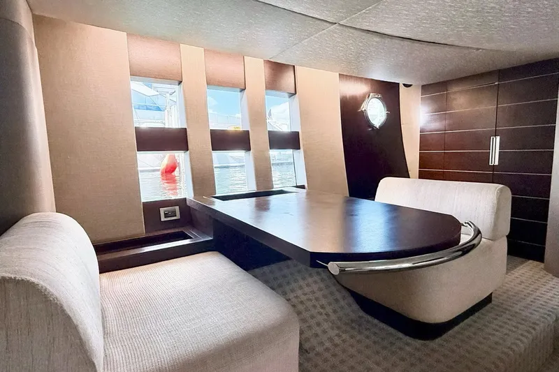 Boat Yacht Photos Pics Luxurious interior of 2011 Azimut 68S yacht with elegant seating and modern design.