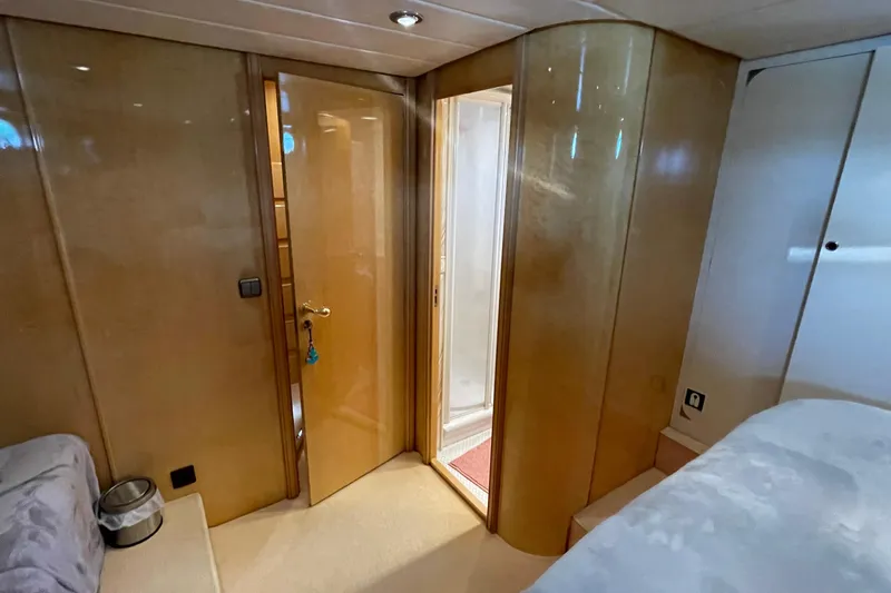  Yacht Photos Pics Luxurious interior of 1995 PR Marine 82 yacht with wooden finishes and modern design.