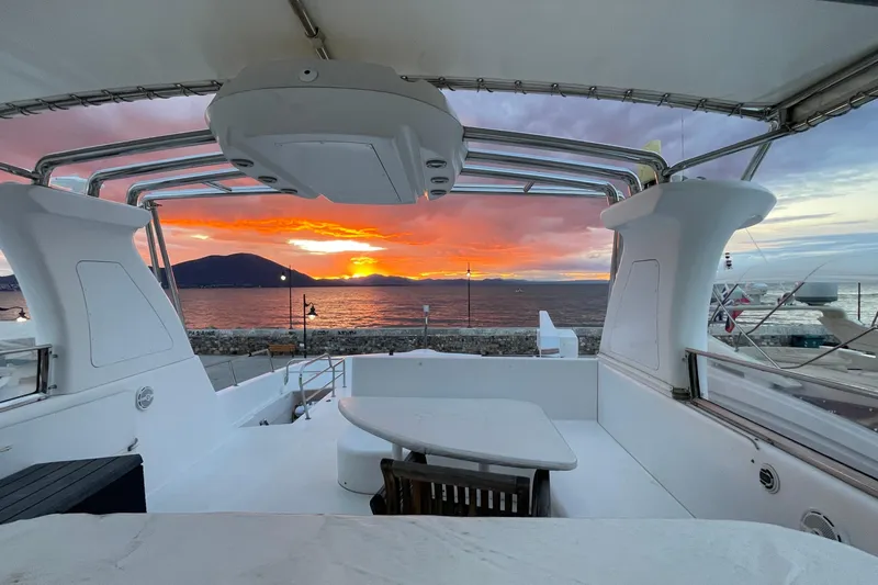 Yacht Photos Pics Luxurious 1995 PR Marine 82 yacht with stunning sunset ocean view.