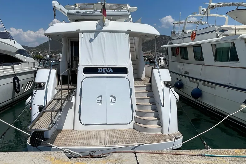  Yacht Photos Pics Luxury yacht "Diva" docked, PR Marine 82 model, 1995, in a sunny marina.