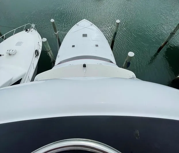 Red Witch Yacht Photos Pics Overhead view of 2001 Custom Carolina Lydia 57 Sportfish docked at marina.