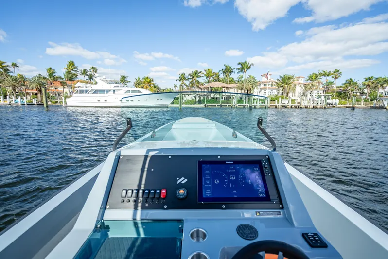  Yacht Photos Pics Goldfish 28 Tender 2024 boat dashboard with waterfront view.