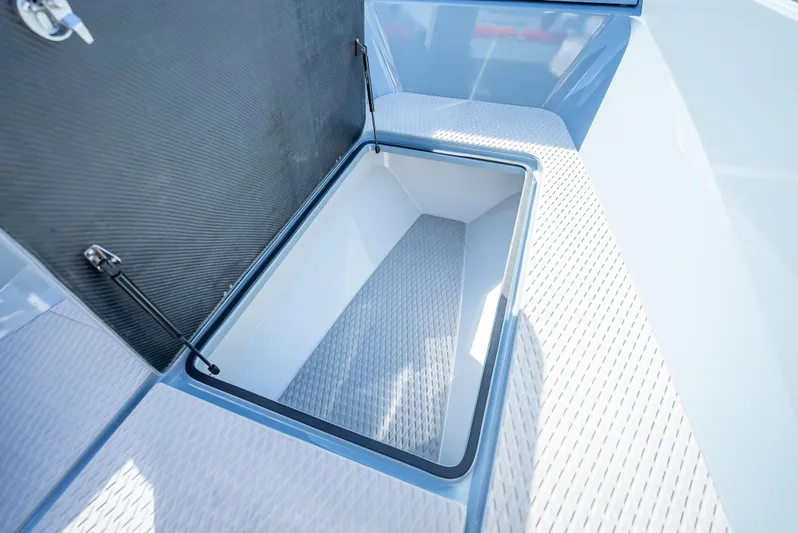  Yacht Photos Pics Storage compartment of the 2024 Goldfish 28 Tender boat.