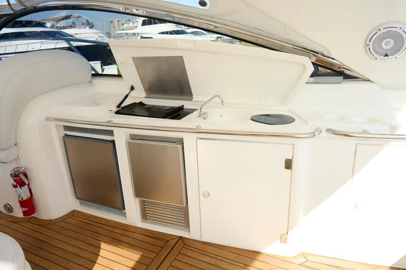 Distraction Yacht Photos Pics Sunseeker Camargue 50 yacht kitchen area with grill and sink, 2000 model.