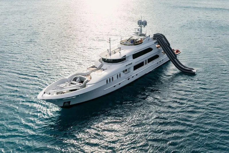 Just Enough Yacht Photos Pics Luxurious 2012 Ares Custom Marine 141 yacht with slide on open sea.