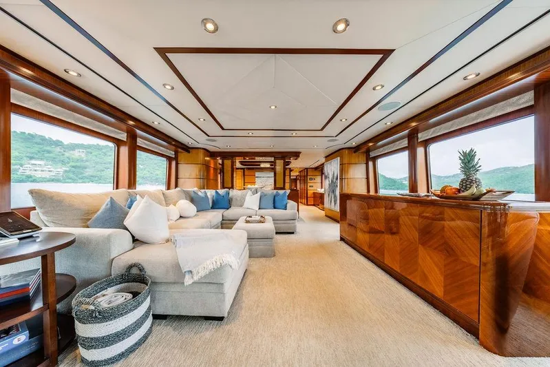 Just Enough Yacht Photos Pics Luxurious interior of 2012 Ares Custom Marine Custom 141 yacht with elegant furnishings and scenic views.