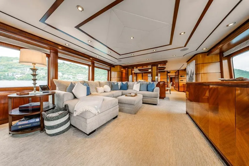 Just Enough Yacht Photos Pics Luxurious interior of 2012 Ares Custom Marine Custom 141 yacht with elegant furnishings.