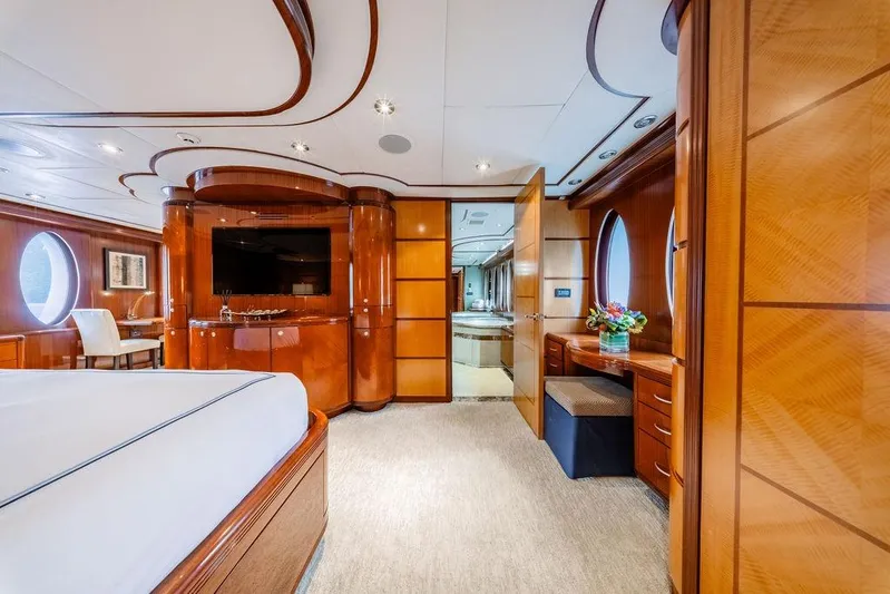 Just Enough Yacht Photos Pics Luxurious 2012 Ares Custom Marine 141 yacht interior with elegant wood finishes and modern amenities.
