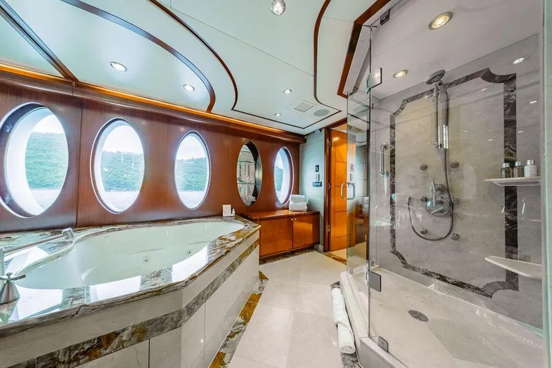 Just Enough Yacht Photos Pics Luxurious yacht bathroom with jacuzzi and glass shower, Ares Custom Marine 141, 2012 model.