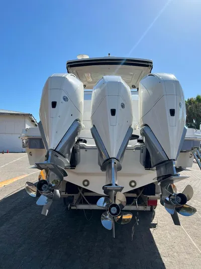Mi Olvido Yacht Photos Pics 2023 Sea Ray Sundancer 320 Outboard with triple engines, rear view.