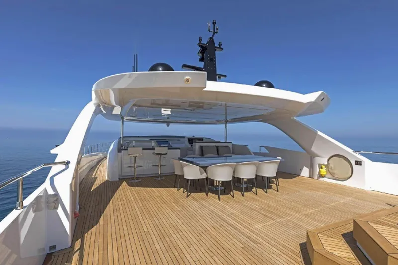 Eden Yacht Photos Pics Luxurious 2022 Maiora 30 Walkaround yacht deck with seating and ocean view.