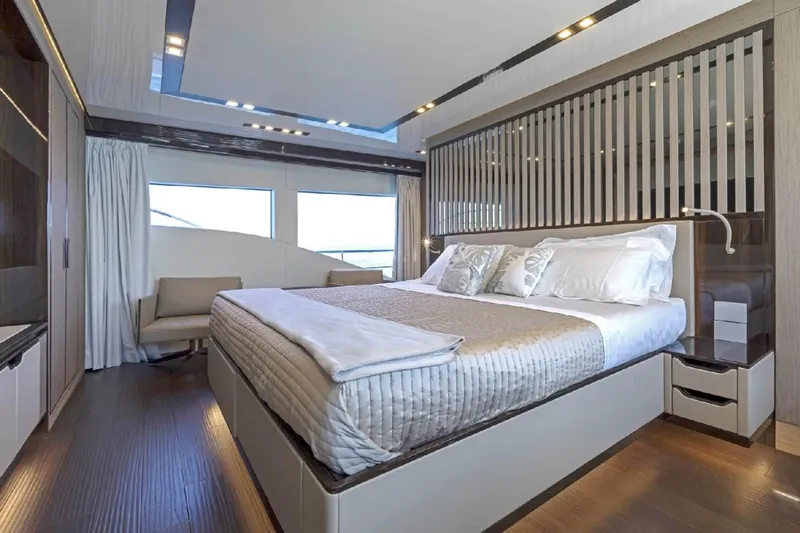 Eden Yacht Photos Pics Luxurious bedroom interior of 2022 Maiora 30 Walkaround yacht with modern design elements.