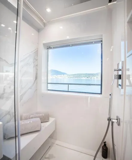 Eden Yacht Photos Pics Luxurious bathroom in 2022 Maiora 30 Walkaround yacht with ocean view.