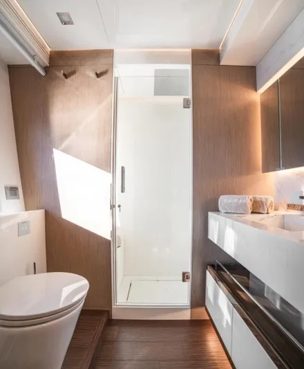 Eden Yacht Photos Pics Luxurious bathroom in 2022 Maiora 30 Walkaround yacht with modern fixtures and elegant design.