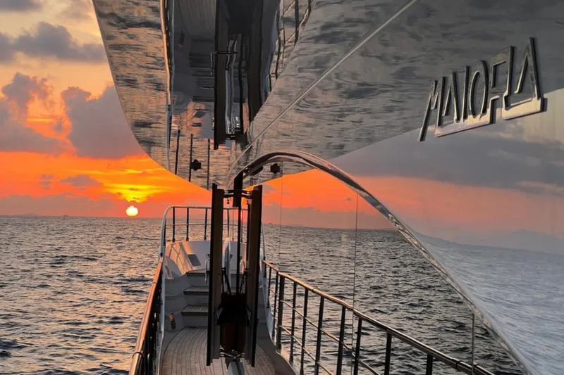 Eden Yacht Photos Pics Maiora 30 Walkaround yacht at sunset, 2022 model, reflecting vibrant ocean view.