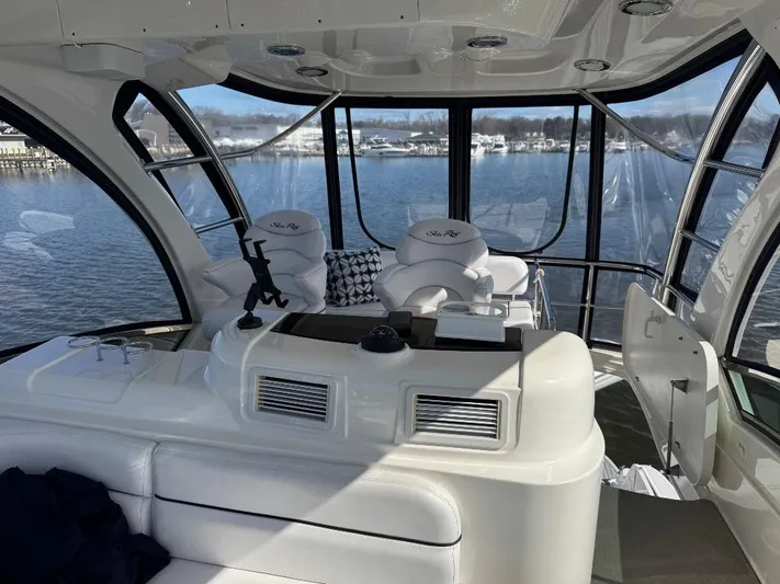  Yacht Photos Pics Interior view of 2005 Sea Ray 500 Sedan Bridge yacht with panoramic windows.
