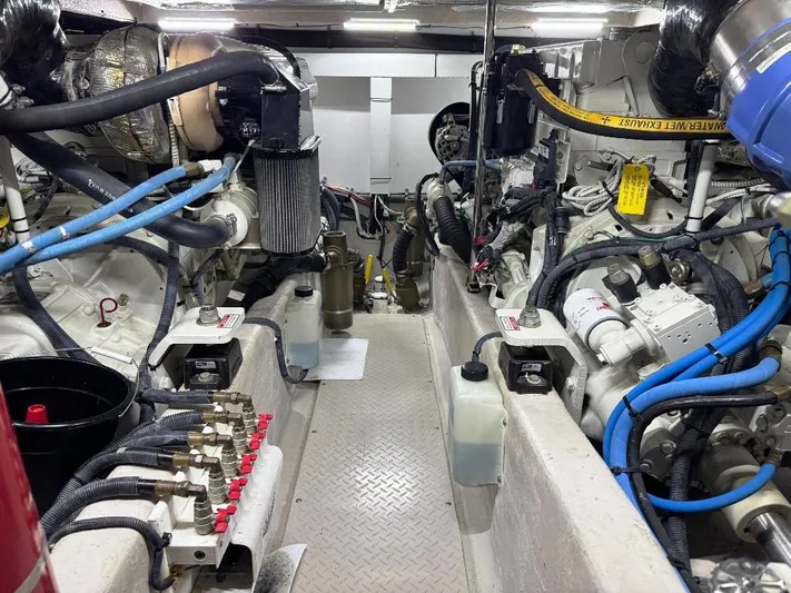  Yacht Photos Pics Engine room of a 2005 Sea Ray 500 Sedan Bridge with visible machinery and components.