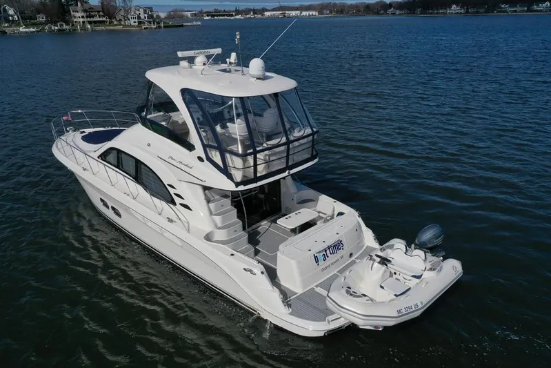  Yacht Photos Pics 2005 Sea Ray 500 Sedan Bridge yacht on calm water, aerial view.