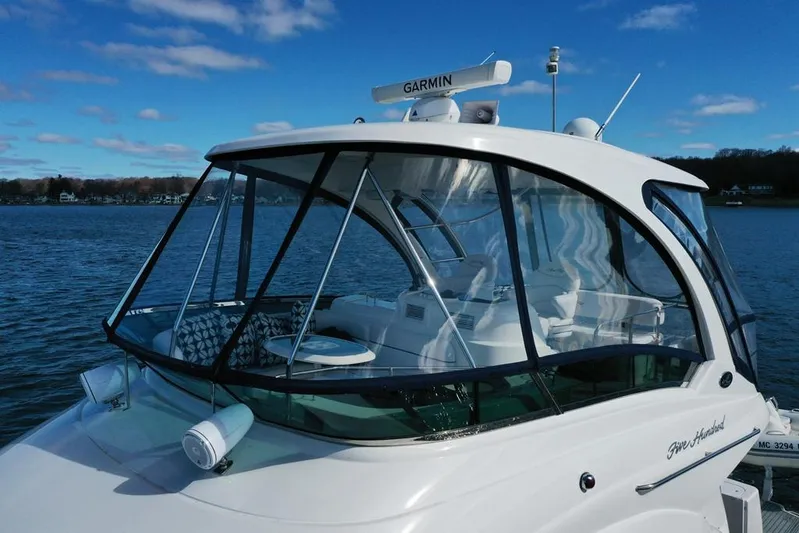  Yacht Photos Pics 2005 Sea Ray 500 Sedan Bridge yacht on water, featuring Garmin equipment.