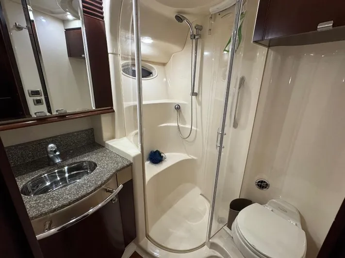  Yacht Photos Pics Luxurious bathroom in 2005 Sea Ray 500 Sedan Bridge yacht with shower and sink.