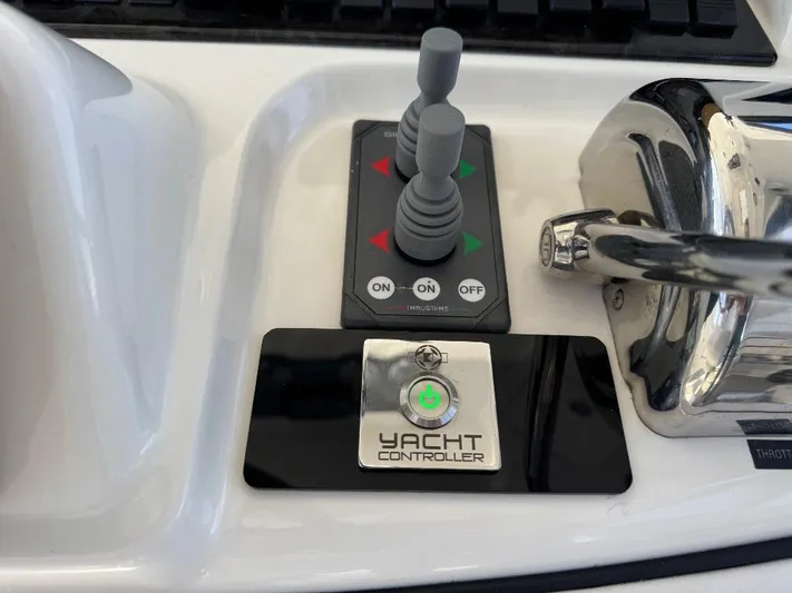  Yacht Photos Pics Control panel of a 2005 Sea Ray 500 Sedan Bridge yacht with joystick and yacht controller.