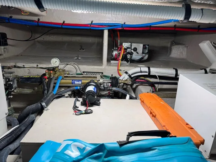  Yacht Photos Pics Engine room of a 2005 Sea Ray 500 Sedan Bridge with visible wiring and equipment.